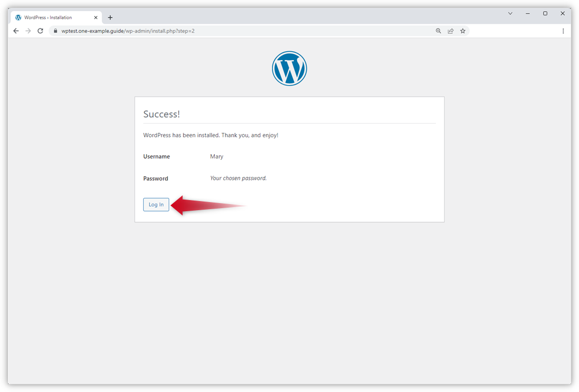 Skärmdumpen visar meddelandet att WordPress har installerats. En röd pil pekar på knappen "Logga in".